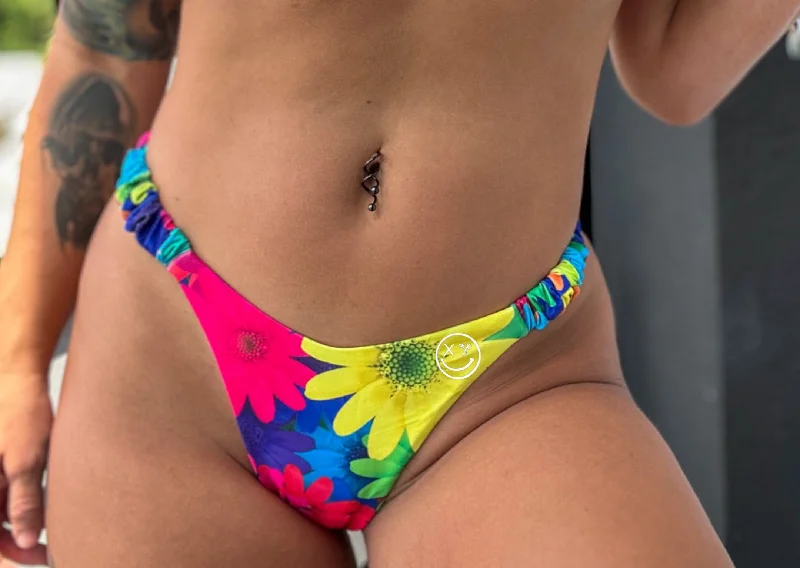 ladies bikini bottoms 60s vibe -Salty Savage Ladies “Spliced Smile” Floral Ruche Thong Bikini Bottom