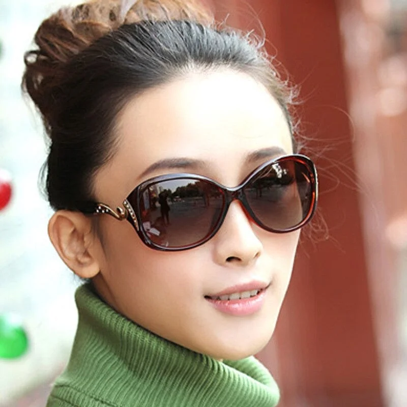 ladies sunglasses top glow -Women's Hot Polarized Fashion Plastic Sunglasses with UV400 Protection